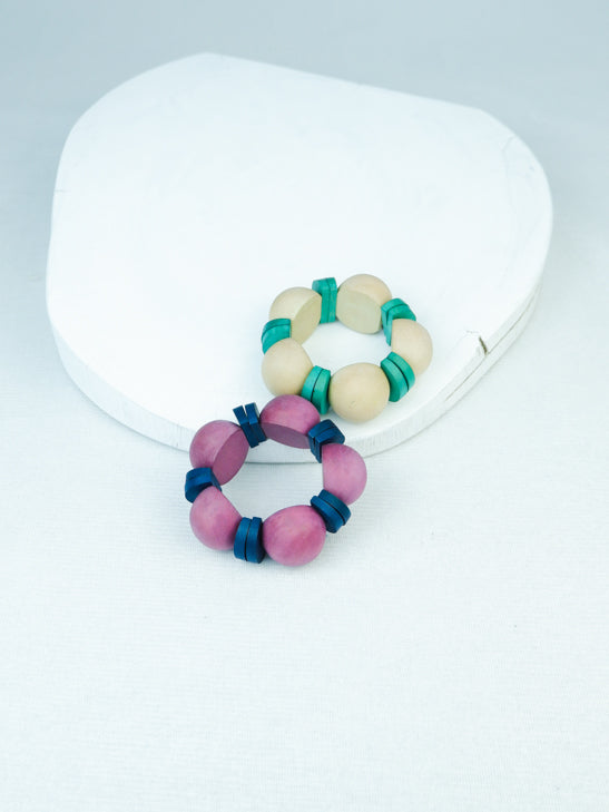 handmade wood geometric bead stretch bracelet in natural and purple