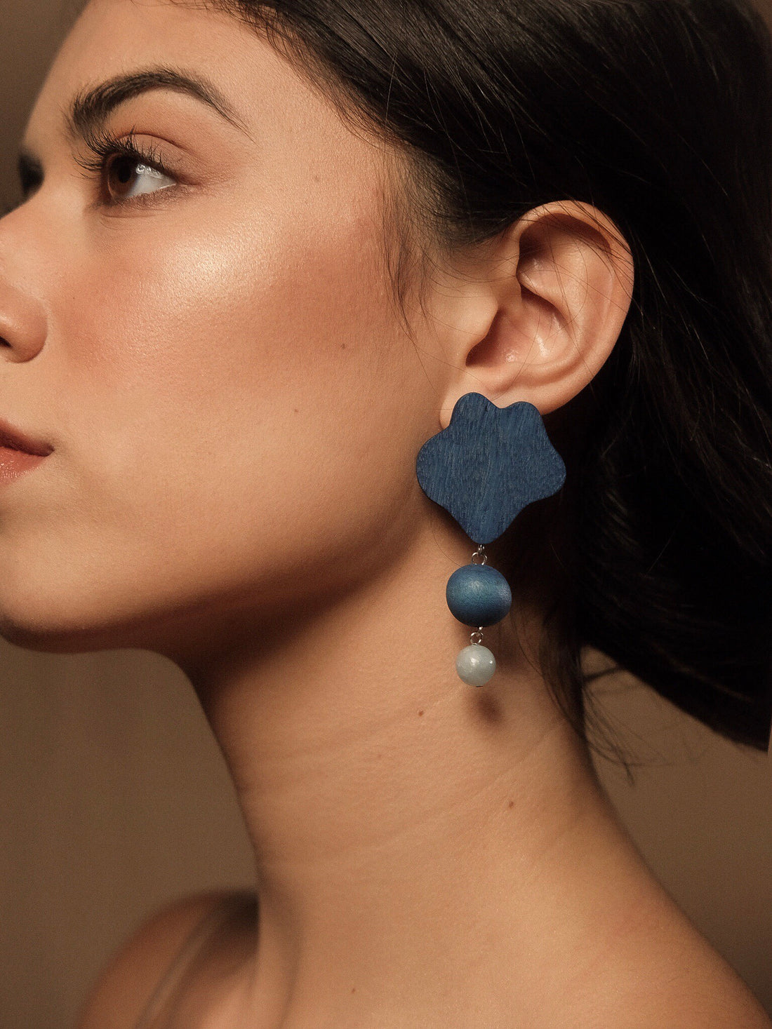 Emma wearing Moy Laguna Handmade Wood Dangling Earrings