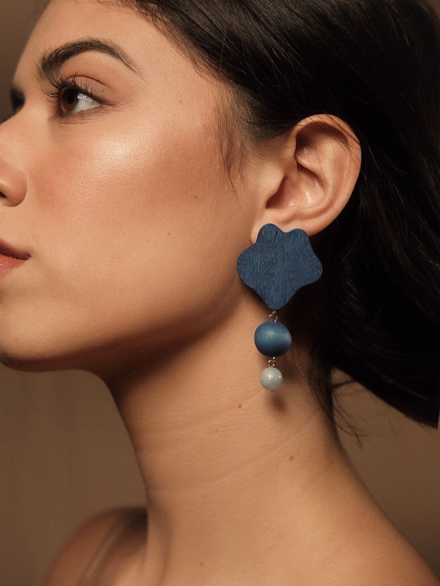 Emma wearing Moy Laguna Handmade Wood Dangling Earrings
