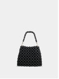 Black beaded handbag on a light gray background