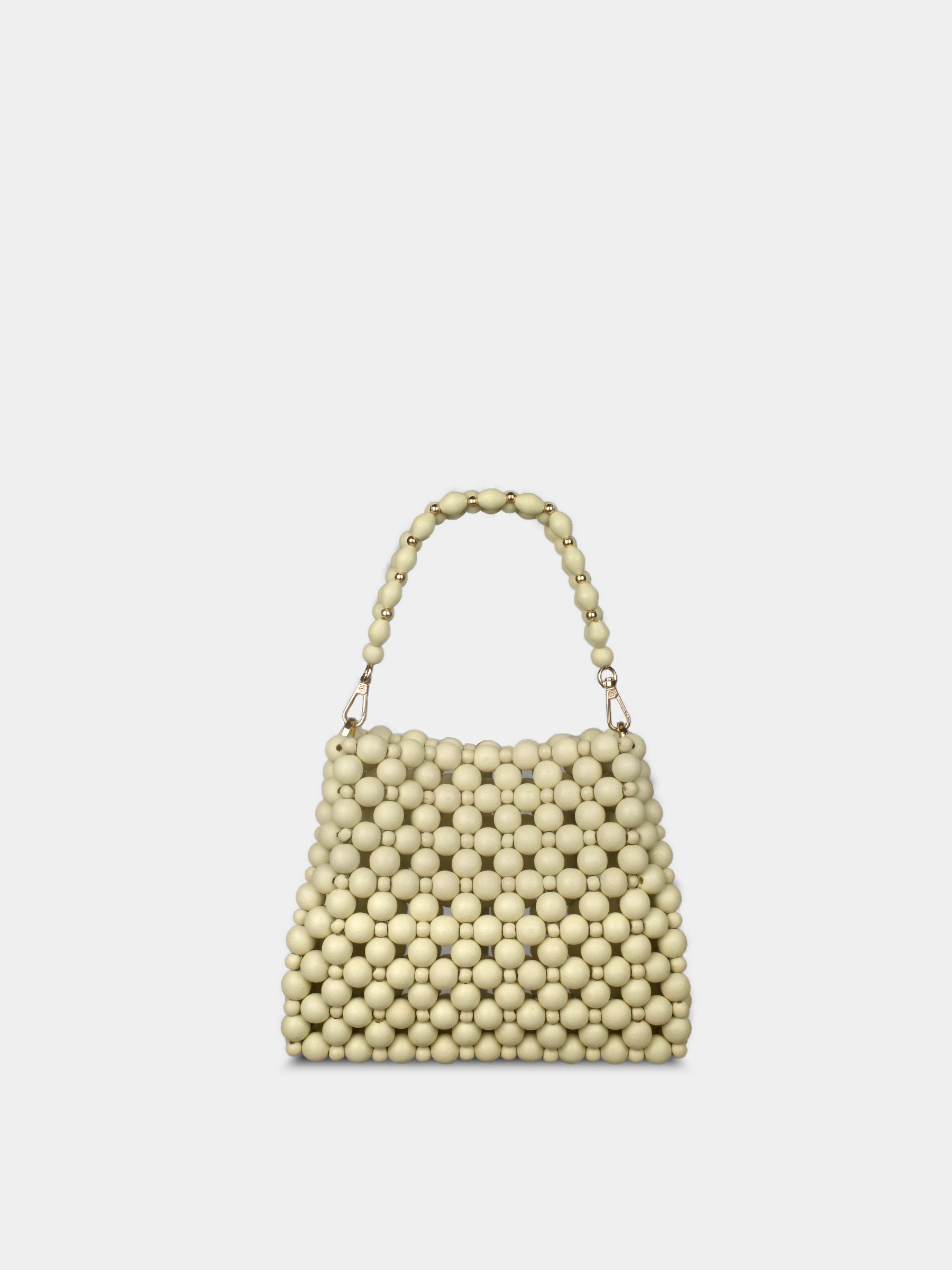 Beaded handbag on a light beige background