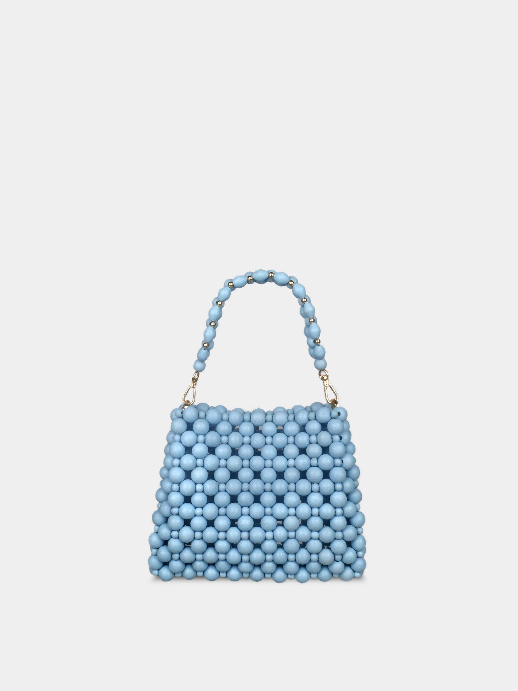 Light blue beaded handbag on a white background