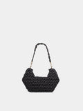Black beaded handbag on a light gray background