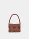 Brown beaded handbag on a light gray background